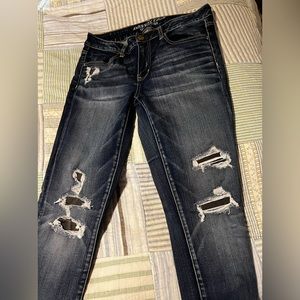 American Eagle women’s jeggings size 12 ripped with material behind